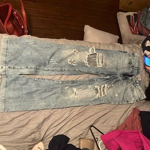 light denim ripped flare/trousers, Uniq by Litz brand size 26, inseam 31”